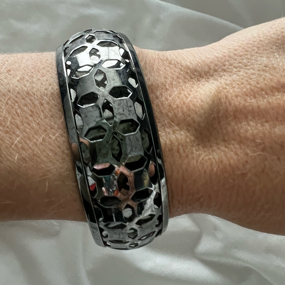 Silver tone metal bangle